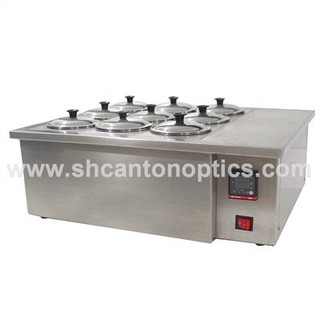 Optisk linsefarvningsmaskine